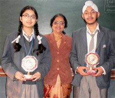 Parneet Singh and Radha Bhola alongwith their Mathematics teacher Mrs. Lakshmi Srinivas, when they qualified for the National Level Science Exhibition - Click to Enlarge