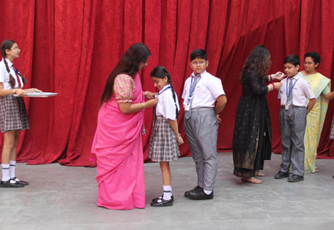 St. Marks Sr. Sec. Public School, Janakpuri - The monitors of Classes Nursery to XII were pinned with badges of responsibility : Click to Enlarge