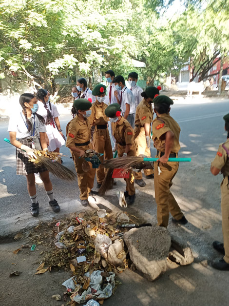 SMS, Meera Bagh - Our NCC Cadets and students of Std. XI paid their respects to Mahatma Gandhi and Lal Bahadur Shastri by taking the Swachchata pledge and involving in a community cleanliness drive : Click to Enlarge