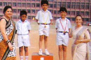 Atharv Malhotra II-E, Abhishek Dutt II-A and Sarthak Khandelwal II-D - winners of 50m Flat Race