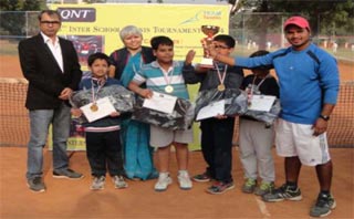 St. Mark's School, Meera Bagh - 3rd Inter School Tennis Tournament 2014 - Boys Junior School Team champions with their winners trophy and their coach Gaurav : Click to Enlarge