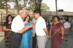 Manager, Mr. L. K Rai presenting a Badge to the School Captain ‘Sanshit Gulati’