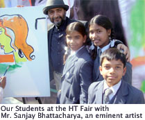 SMS Sr., Janakpuri - Inter School Competitions - Our Students at the HT Fair with Mr. Sanjay Bhattacharya, an eminent artist : Click to Enlarge