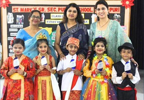 St. Marks Sr. Sec. Public School, Janakpuri - Every Dress Tells a Tale, Competition was organised for the students of Class 2, following the theme of 'Around the World : Click to Enlarge