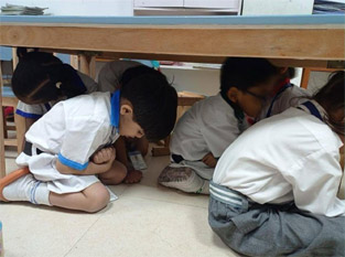 St. Marks Sr. Sec. Public School, Janakpuri - A Mock Earthquake Drill was conducted for Classes Nursery to XII to practice emergency plans : Click to Enlarge